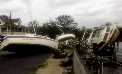 Boats pushed ashore by Hurricane Katrina