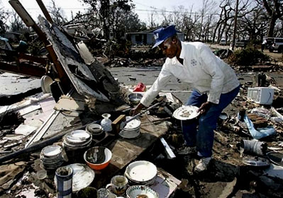 A Hurricane Katrina survivor prepares a meal