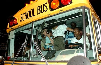 Hurricane Katrina survivors evacuate on a school bus