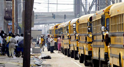 A line of school buses prepare to evacuate Hurricane Katrina survivors